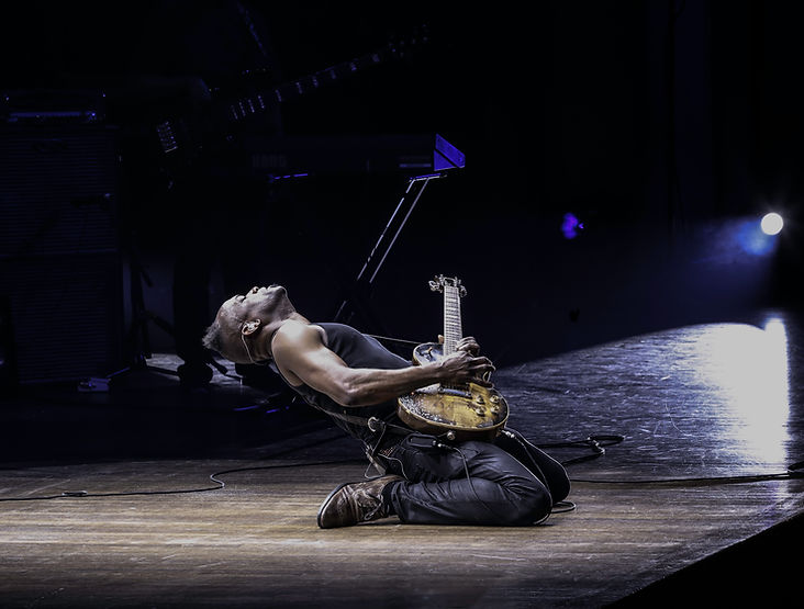 Musicians and collaborators gathered at a live production
